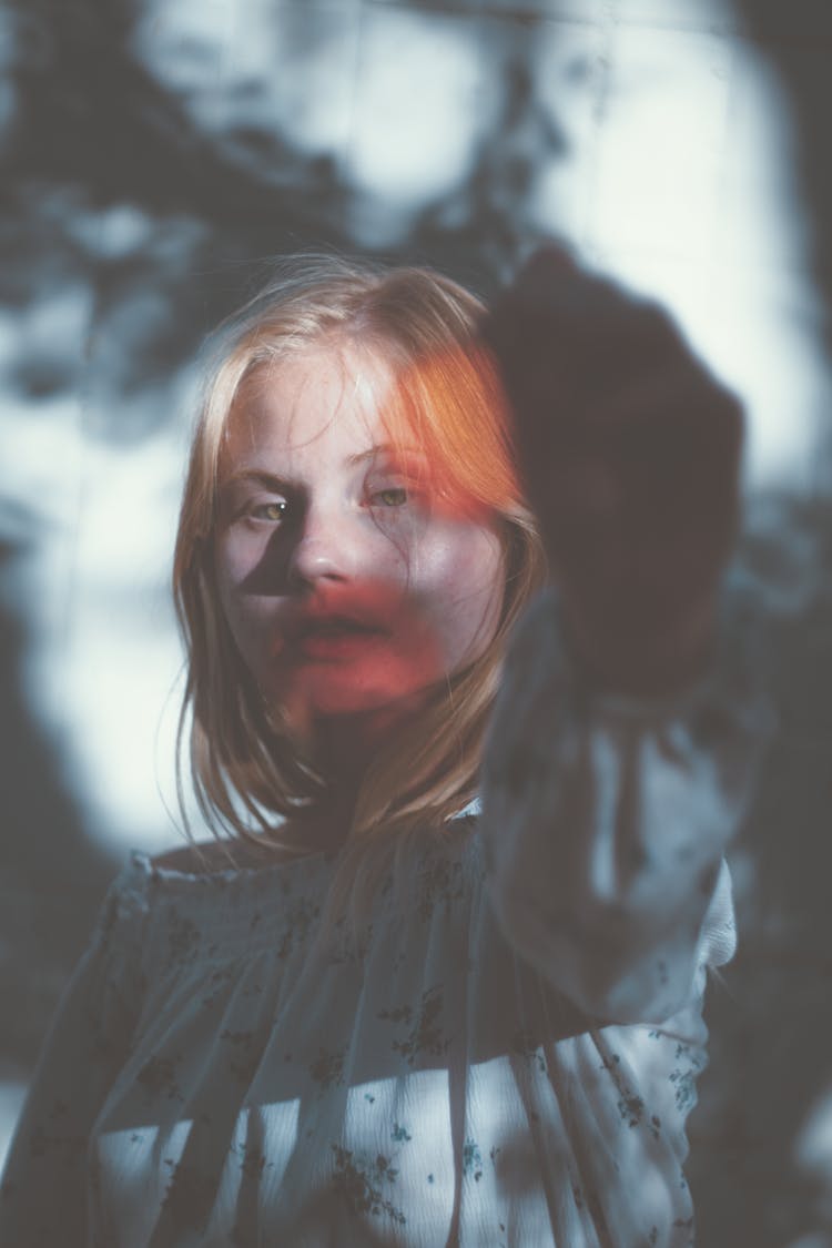 Photo Of A Girl With Shadows On Her Face 