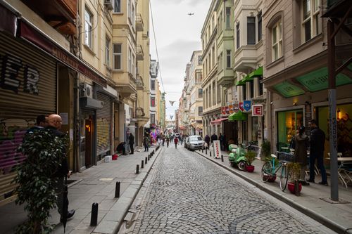 Free A bustling narrow street in Istanbul, showcasing urban life and historic architecture. Stock Photo