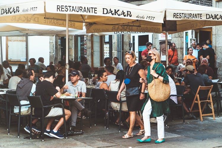 People Eating In An Outdoor Restaurant