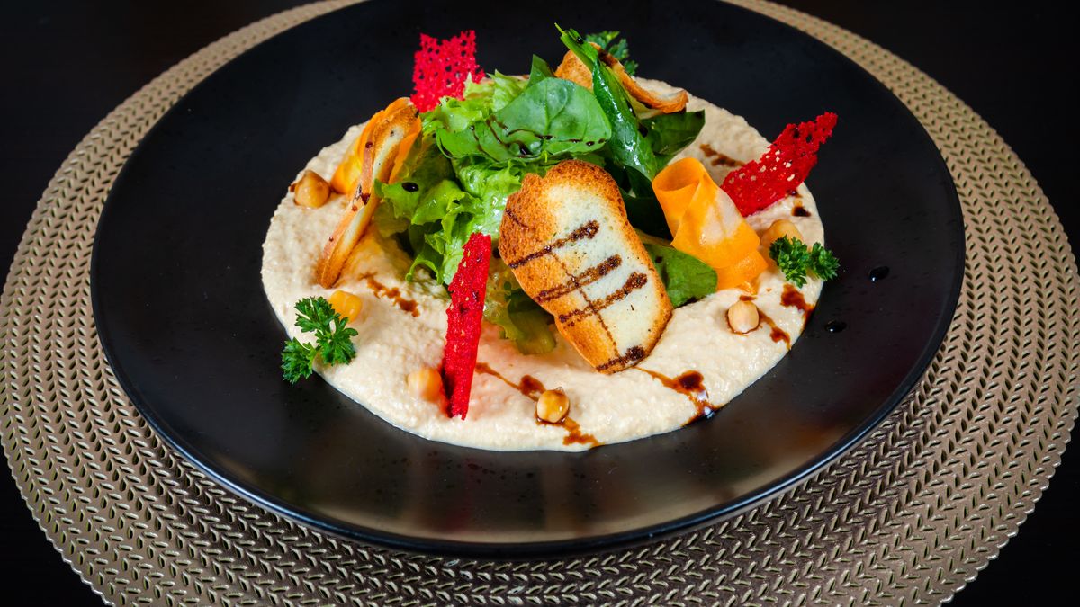 Toast with hummus and red bell pepper