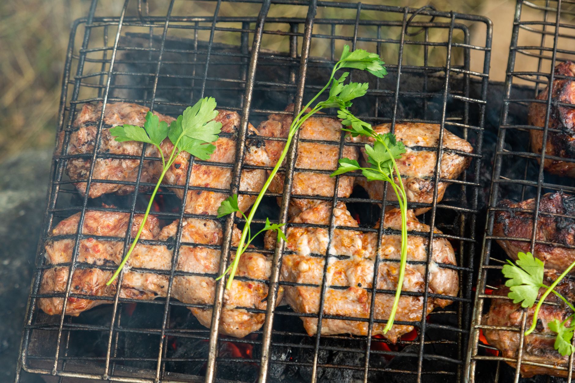 Freshly grilled Nigerian Beef Suya with onions and tomatoes