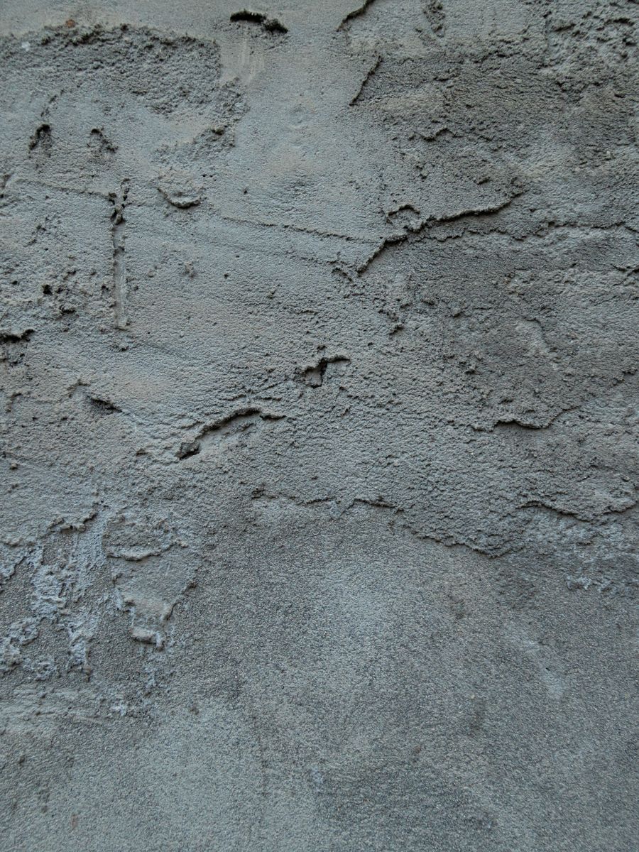 Hand troweled plaster in basalt grey, close up