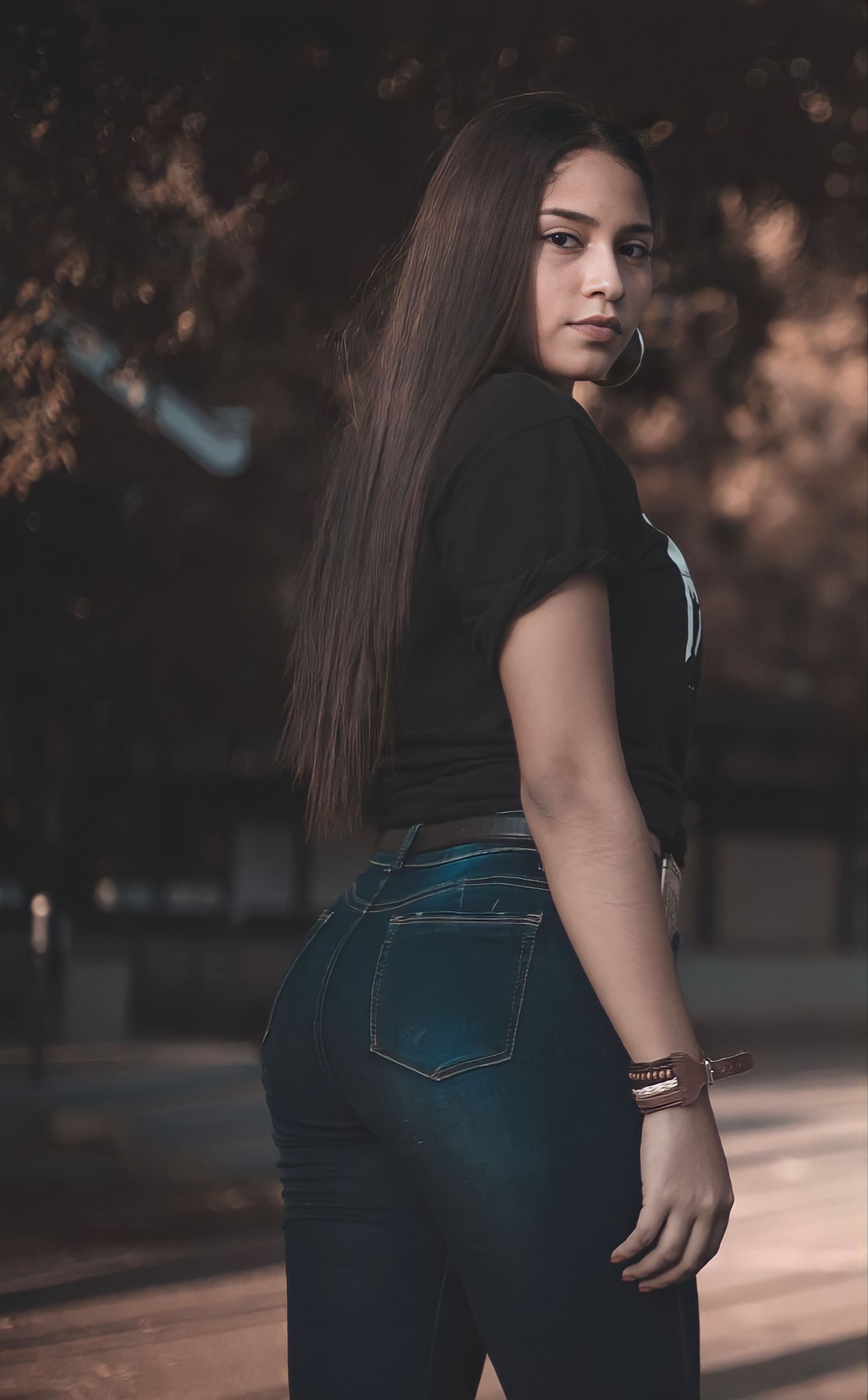 Woman in Black Shirt and Blue Denim Pants · Free Stock Photo