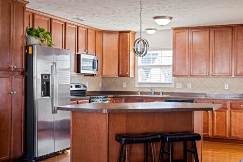 Free Kitchen with Wooden Cabinets  Stock Photo