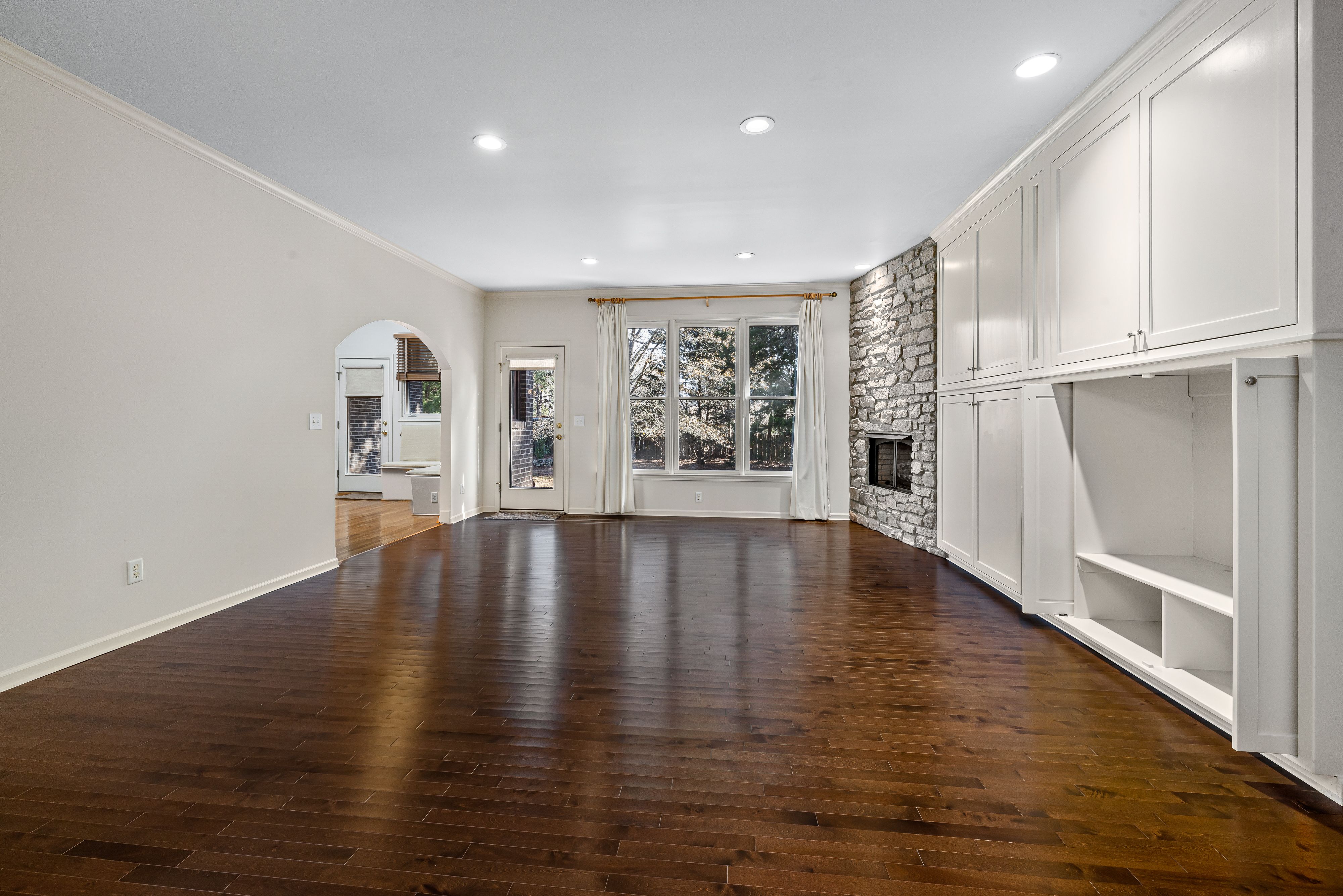 kettlebell training — Brown Wooden Flooring in the House · Free. Photo: Pexels