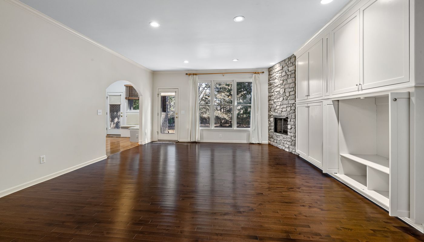 kettlebell training — Brown Wooden Flooring in the House · Free. Photo: Pexels