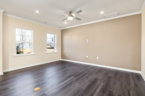 Empty Room with Fan and Lamp