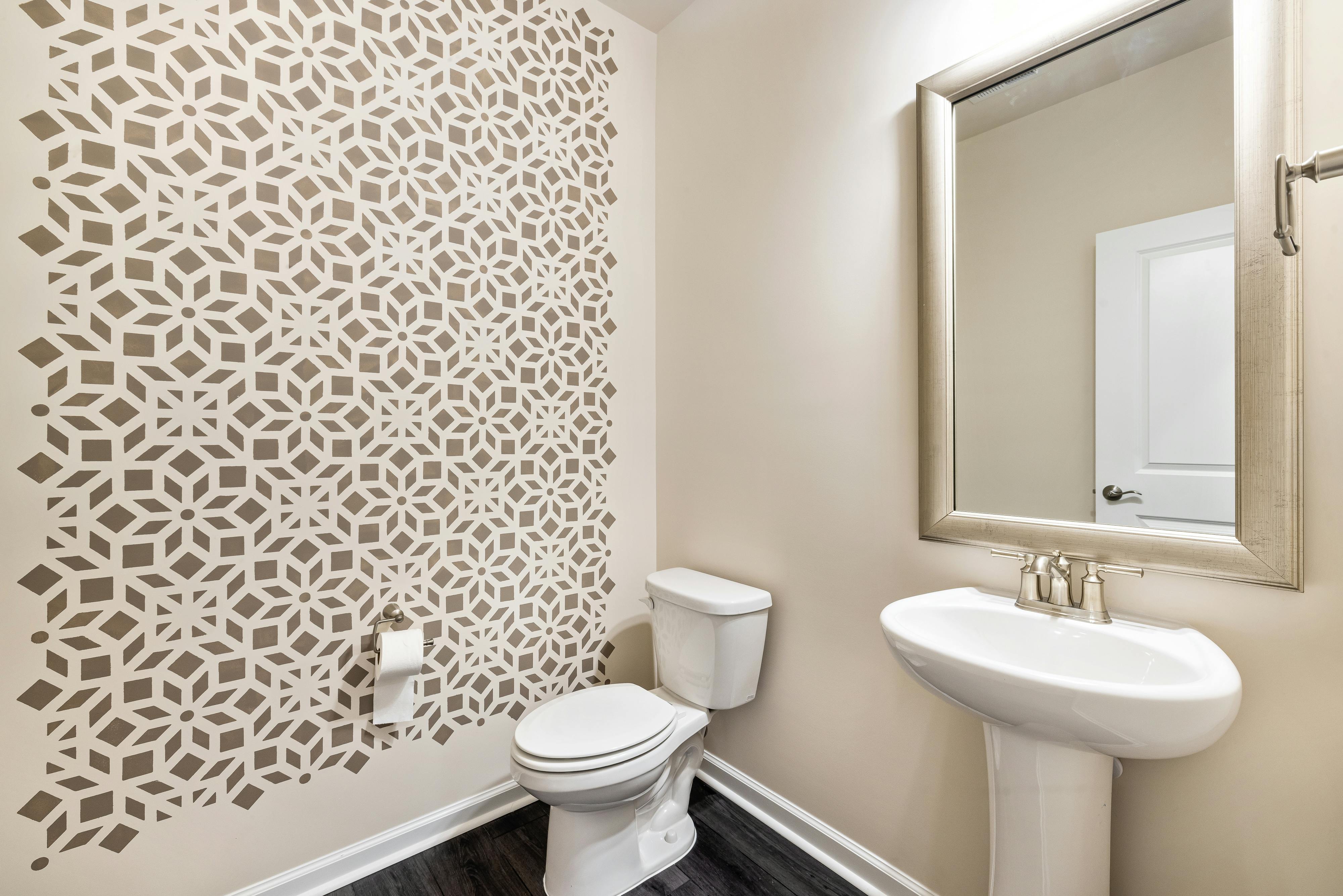 Luxury powder room design with statement wallcoverings
