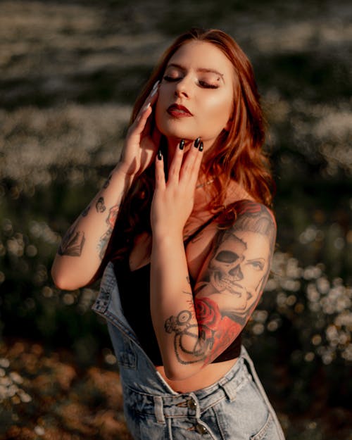 Woman with Tattoo on Her Arms
