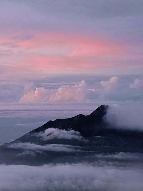Barren Mountain in Clouds at Sunset