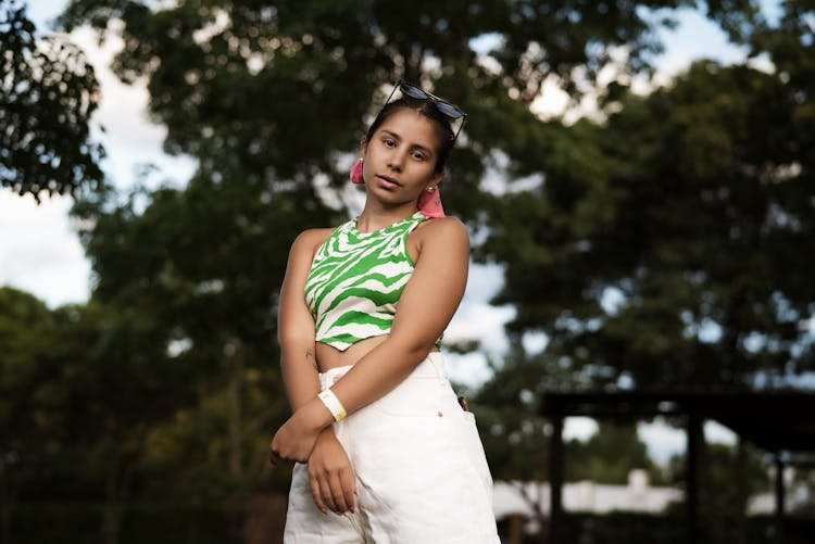 Woman Posing In Blouse And Pants