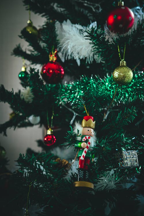 Photo of Ornaments Hanging on Christmas Tree