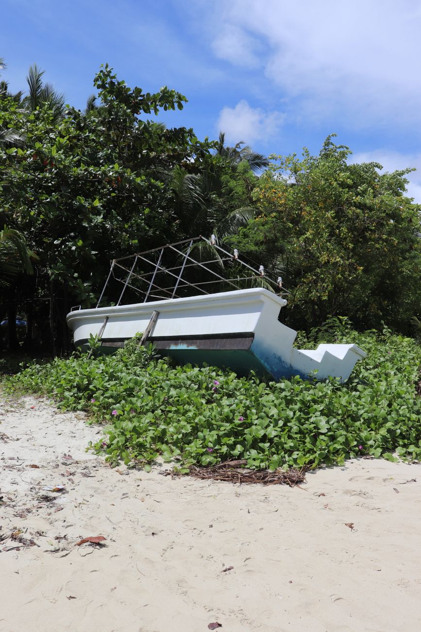 Boat on the white sand shore near Potipot Island, Zambales