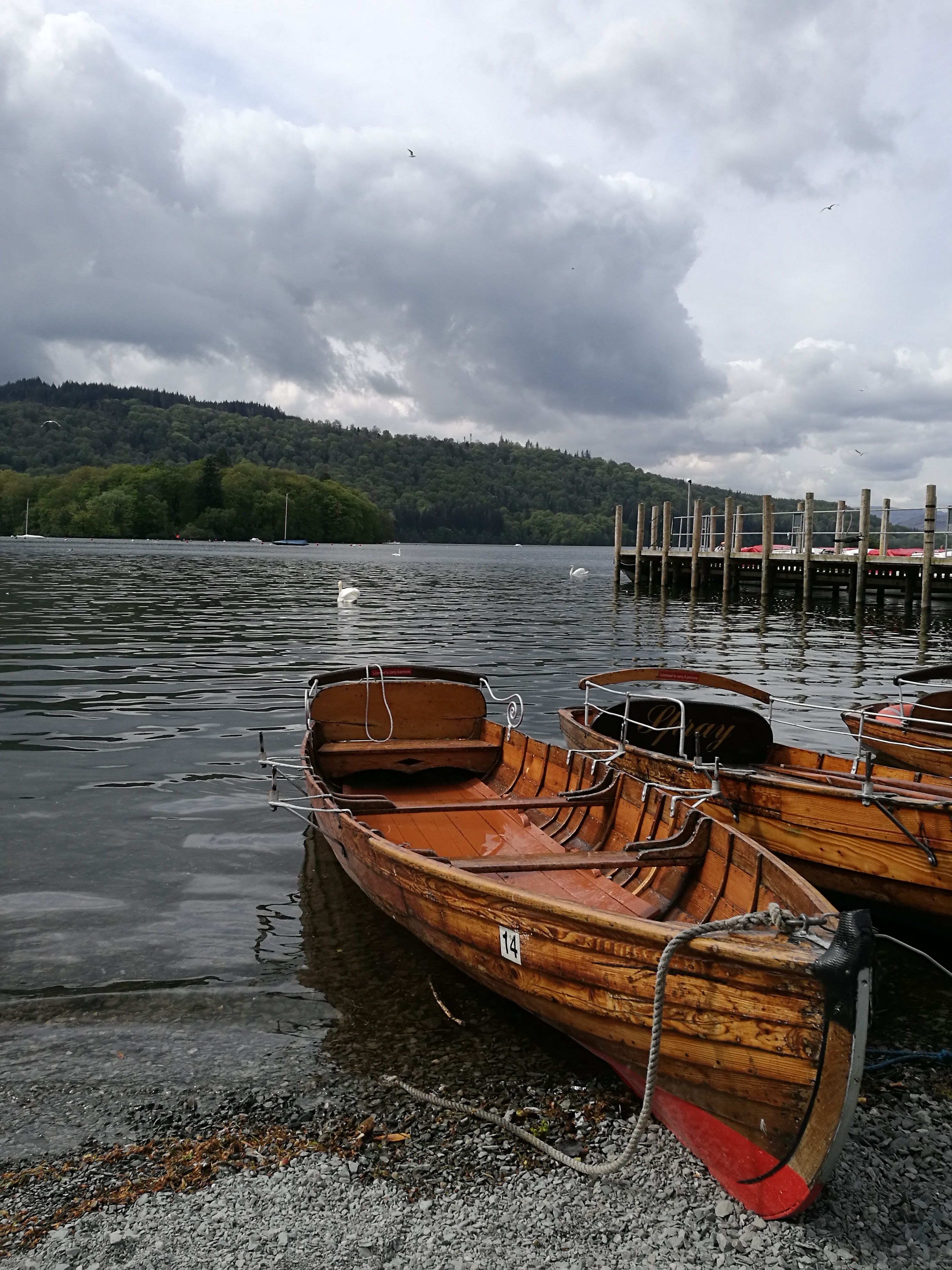Photo of Wooden Boats on a Shore · Free Stock Photo