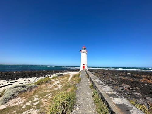 deniz, deniz feneri, gezinme içeren Ücretsiz stok fotoğraf