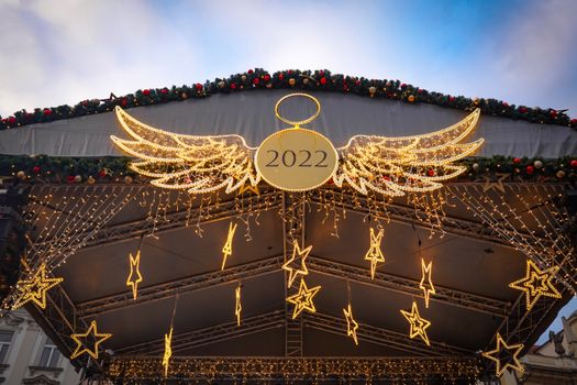 Captivating 2022 Christmas lights display in Prague, showcasing festive stars and wings.