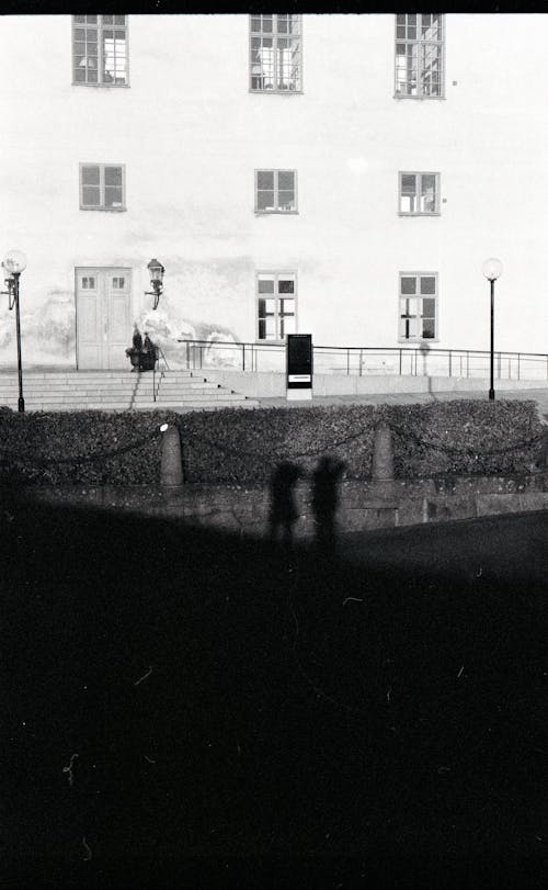 Shadow of People on Wall in Black and White 
