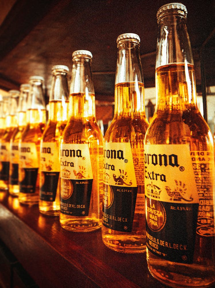 Close-Up Shot Of Bottles Of Beer 