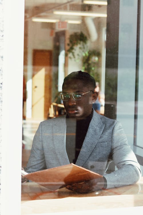 Man Wearing Gray Suit Jacket