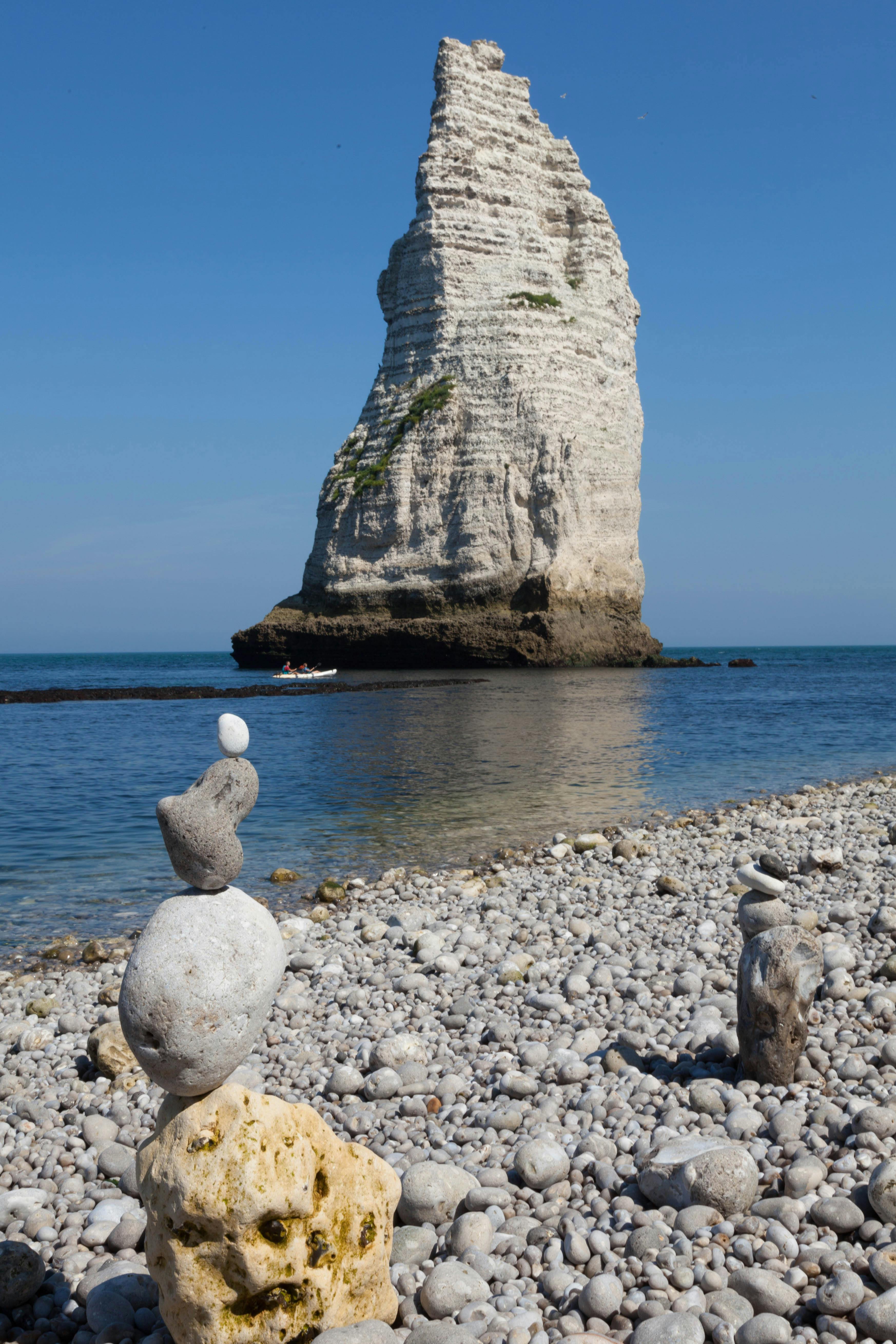 White Rock Formation in Middle of Sea · Free Stock Photo