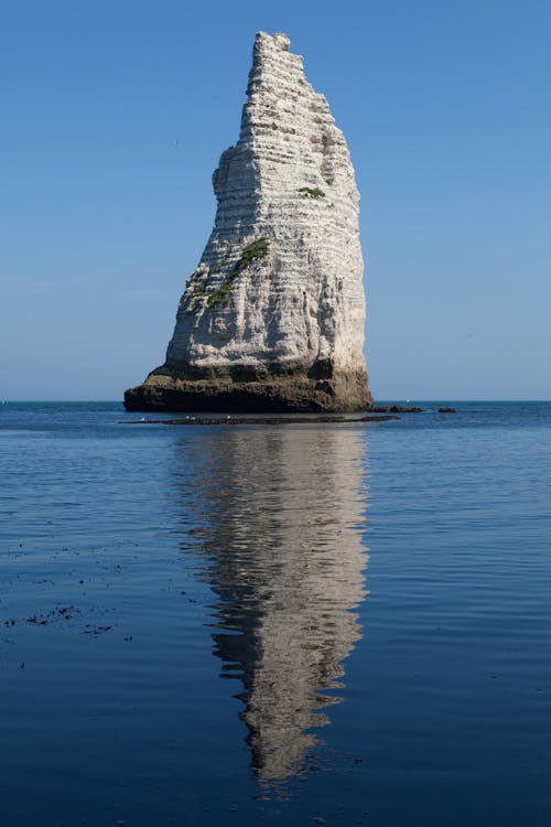 Natural Rock Formation on a Body of Water