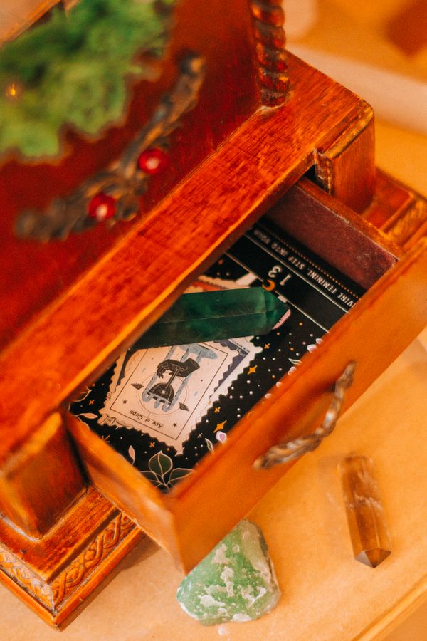 Tarot cards in a wooden drawer