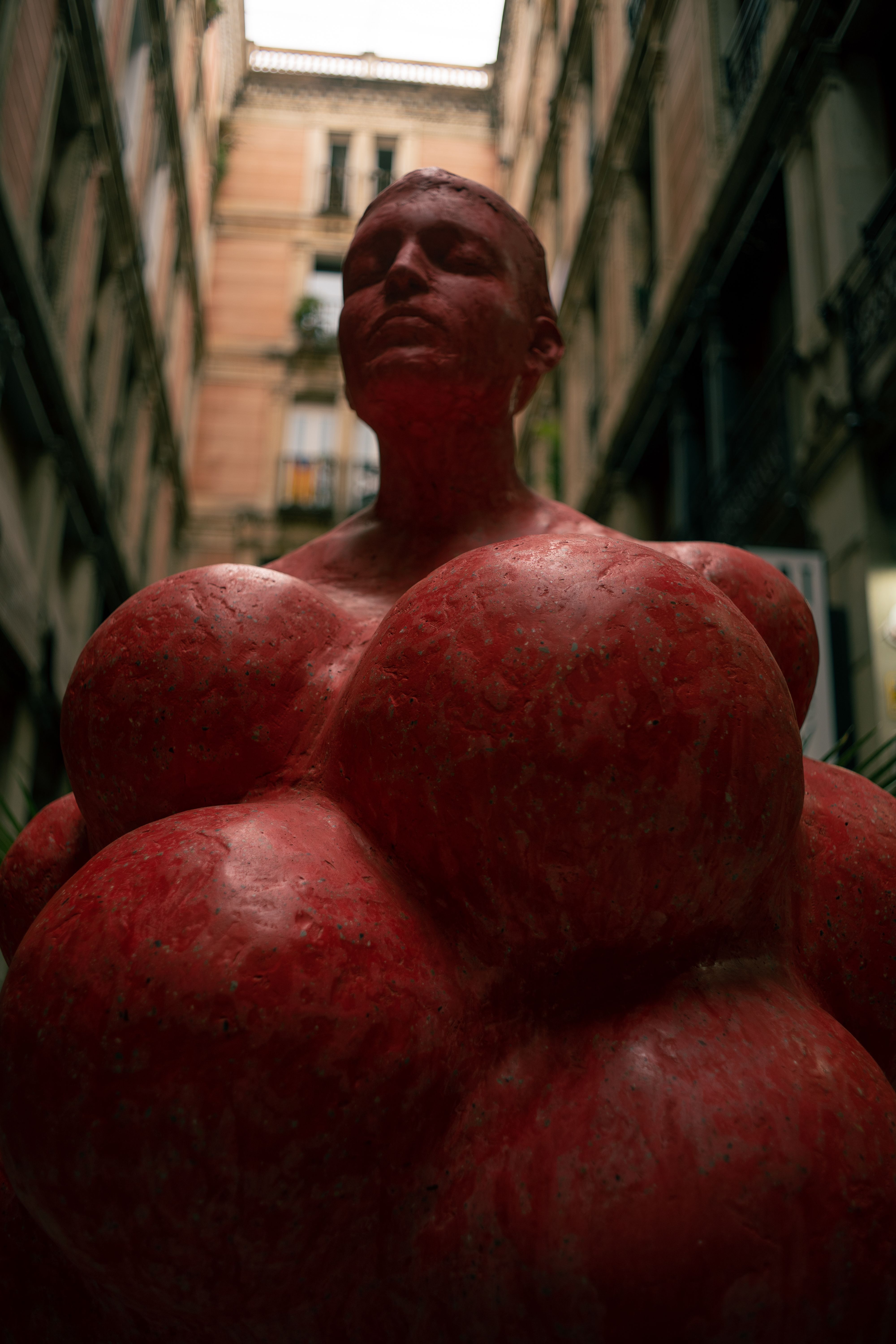 A striking modern sculpture in the urban streets of Barcelona, Spain, showcasing contemporary art.