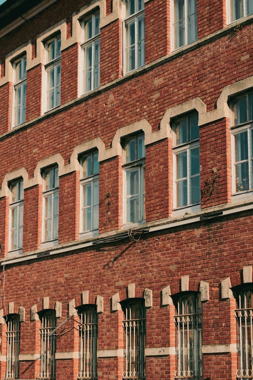 A Brick Building with Glass Windows