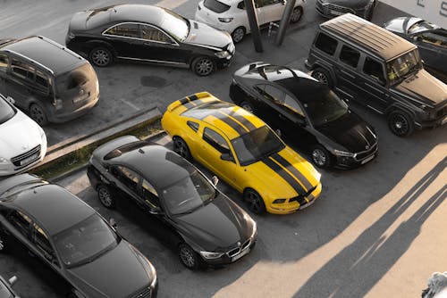 High-Angle Shot of Cars at the Parking Lot