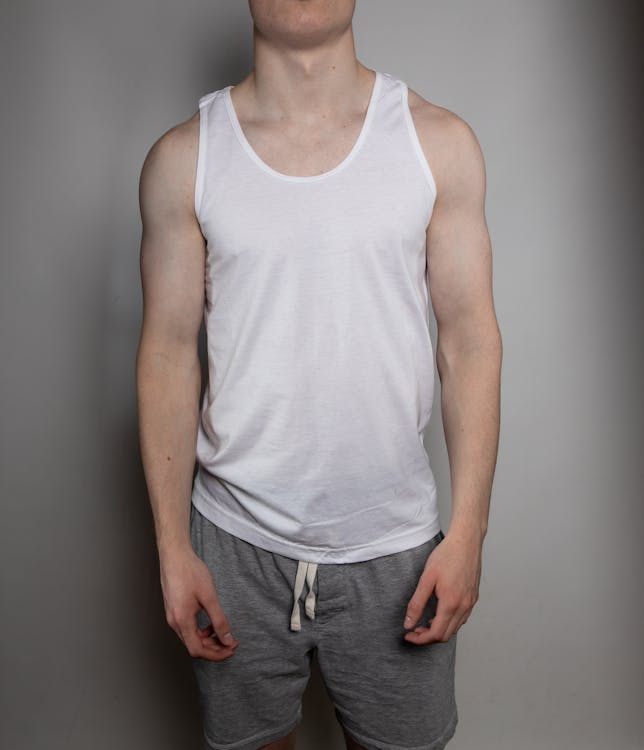 Photo of a Man Wearing a White Tank Top