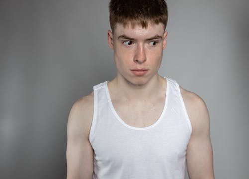 A Portrait of a Young Man in a White Tank Top