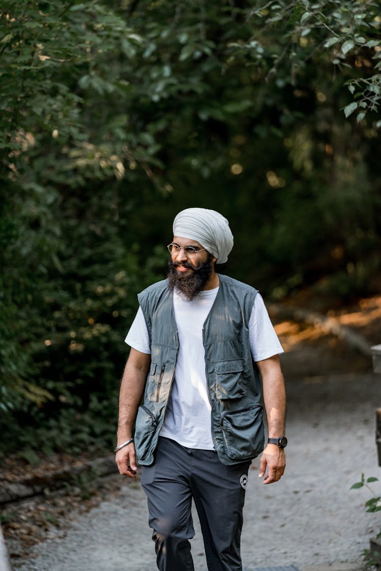 Man Walking In Park