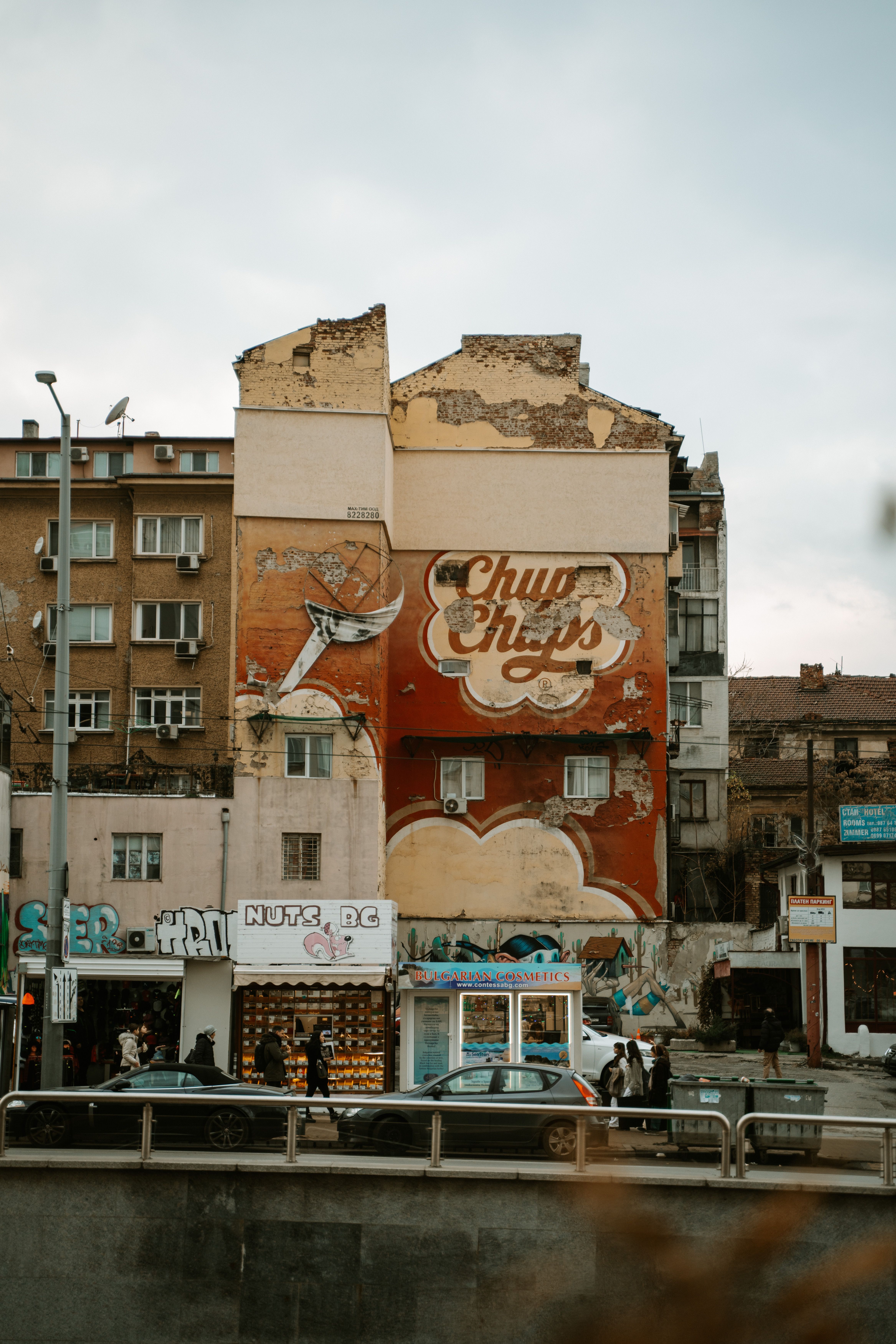 Colorful Chupa Chups mural on an urban street wall in Sofia, Bulgaria.