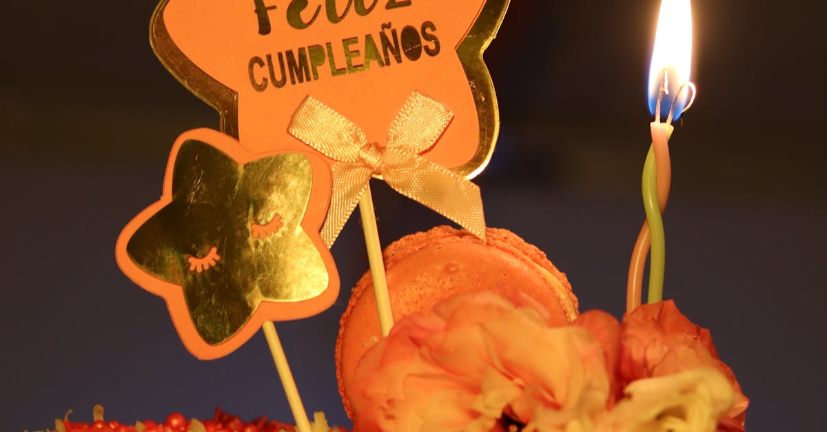 A plate of colorful churros with chocolate dipping sauce.