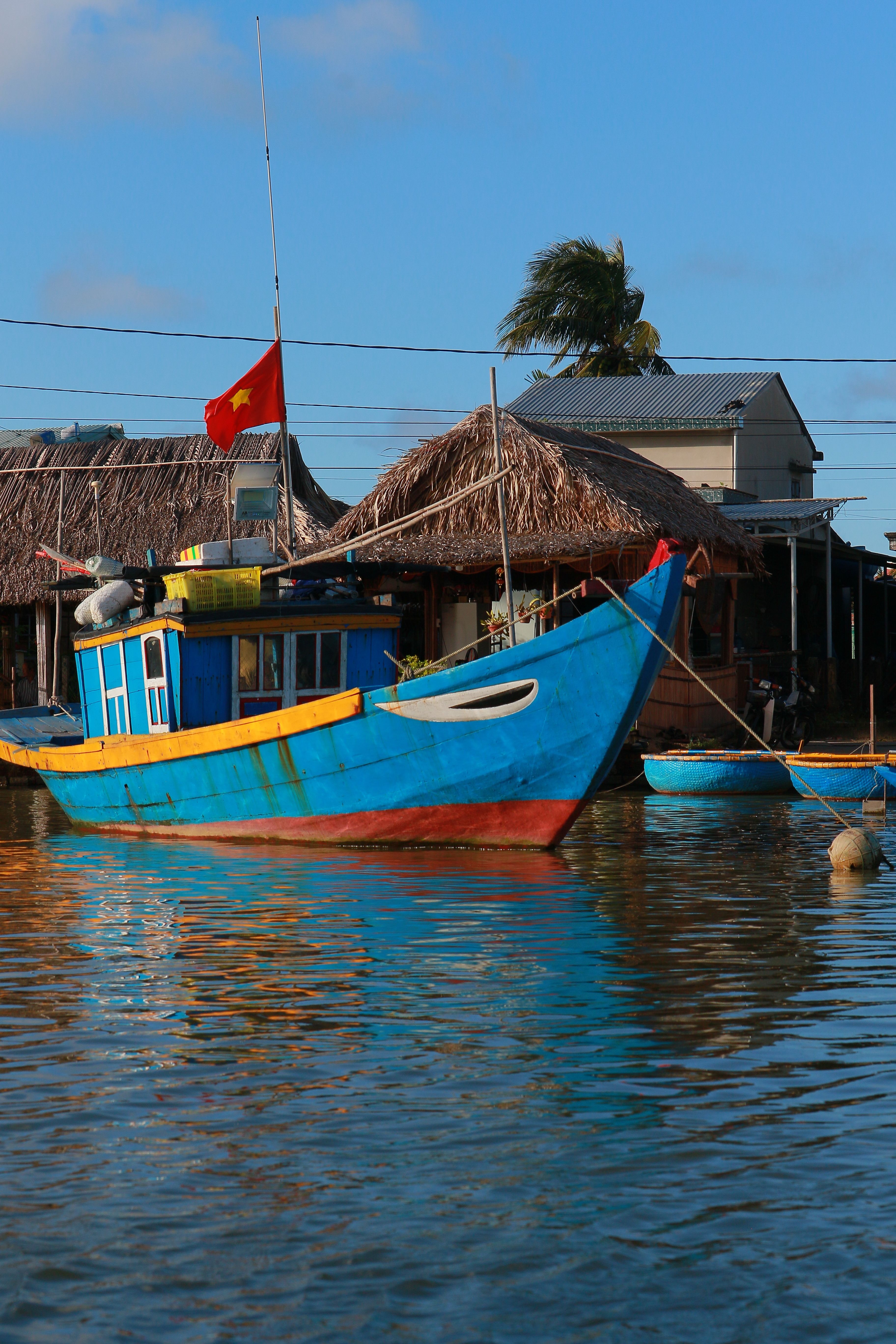 Motorboat Moored in Village · Free Stock Photo