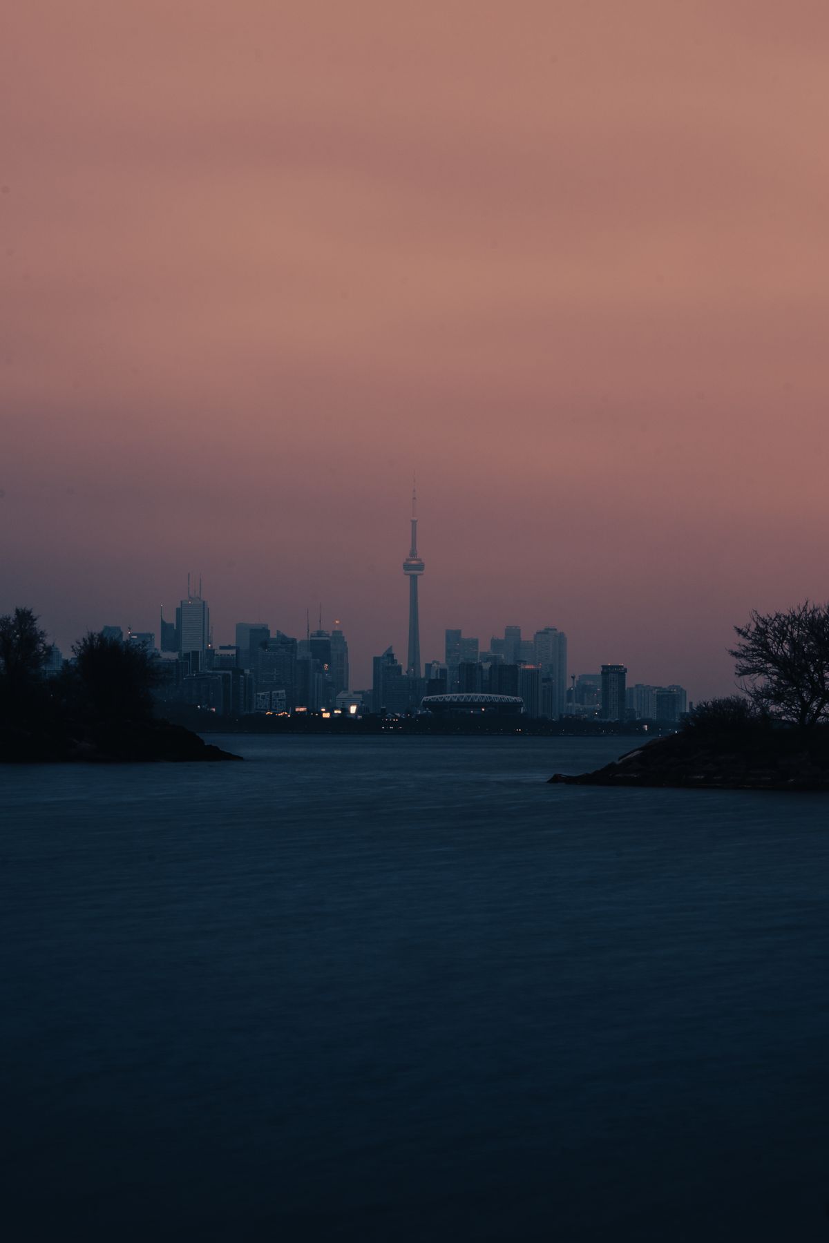 Toronto skyline at sunset with the CN Tower