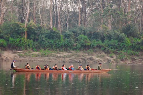 People on Boat on Lake