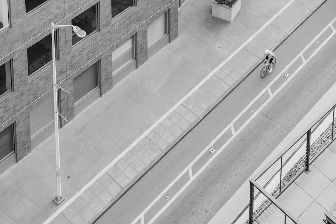 Person Riding a Bike on the Road