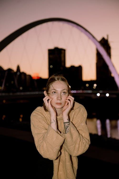 Portrait of Woman in Town at Dusk