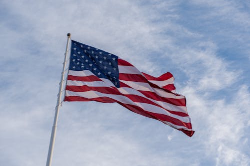 Photo of an American Flag Under the Sky