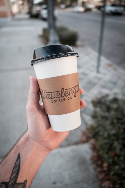 Hand with Disposable Cup