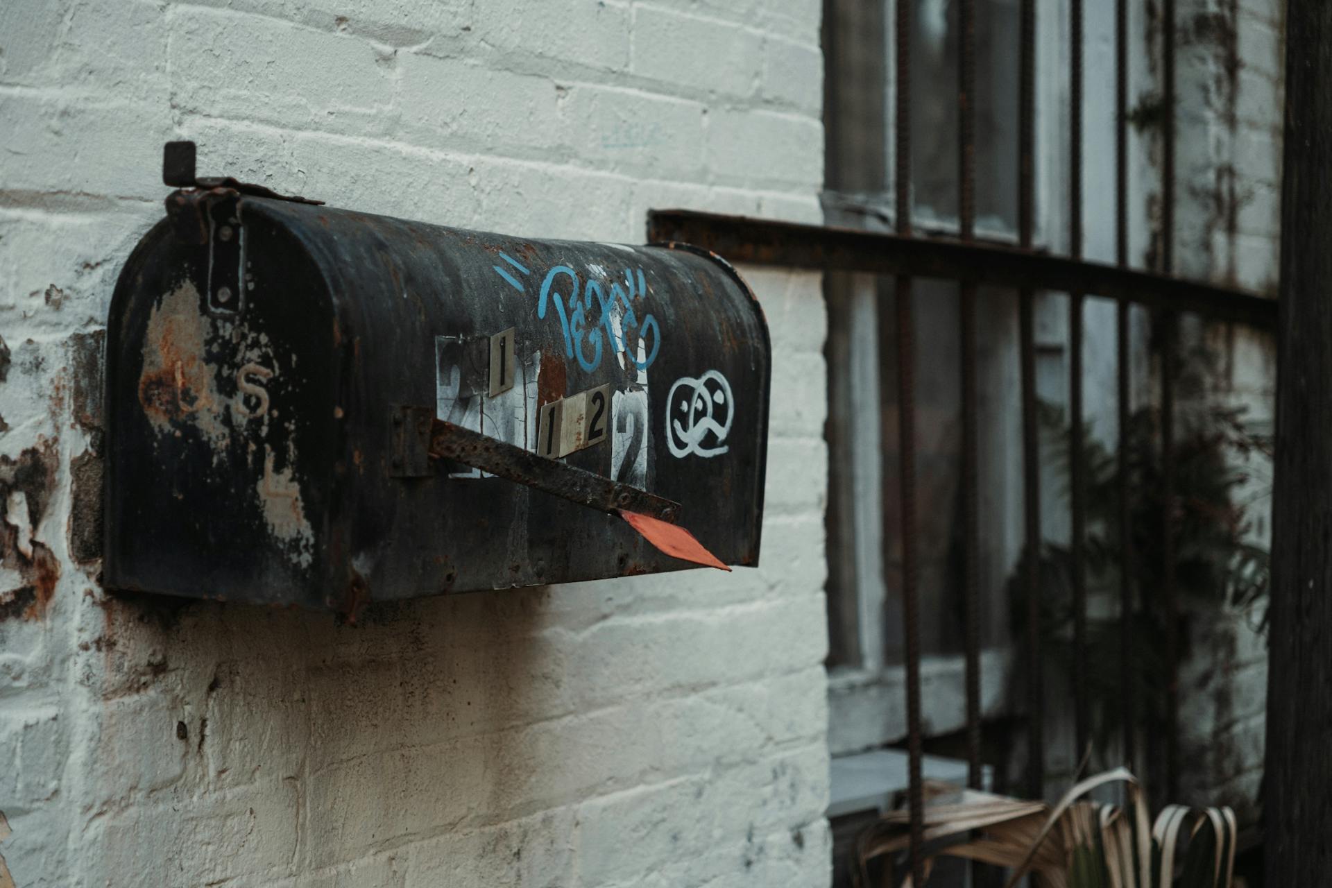 Close-Up Shot of a Rusty Mailbox