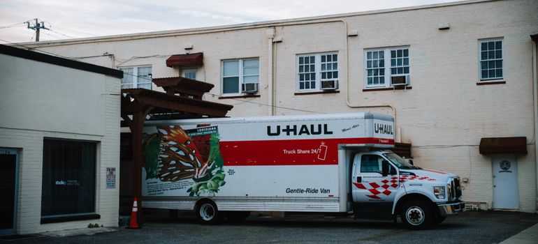 Parked moving truck illustrating Moving near State Farm Stadium.