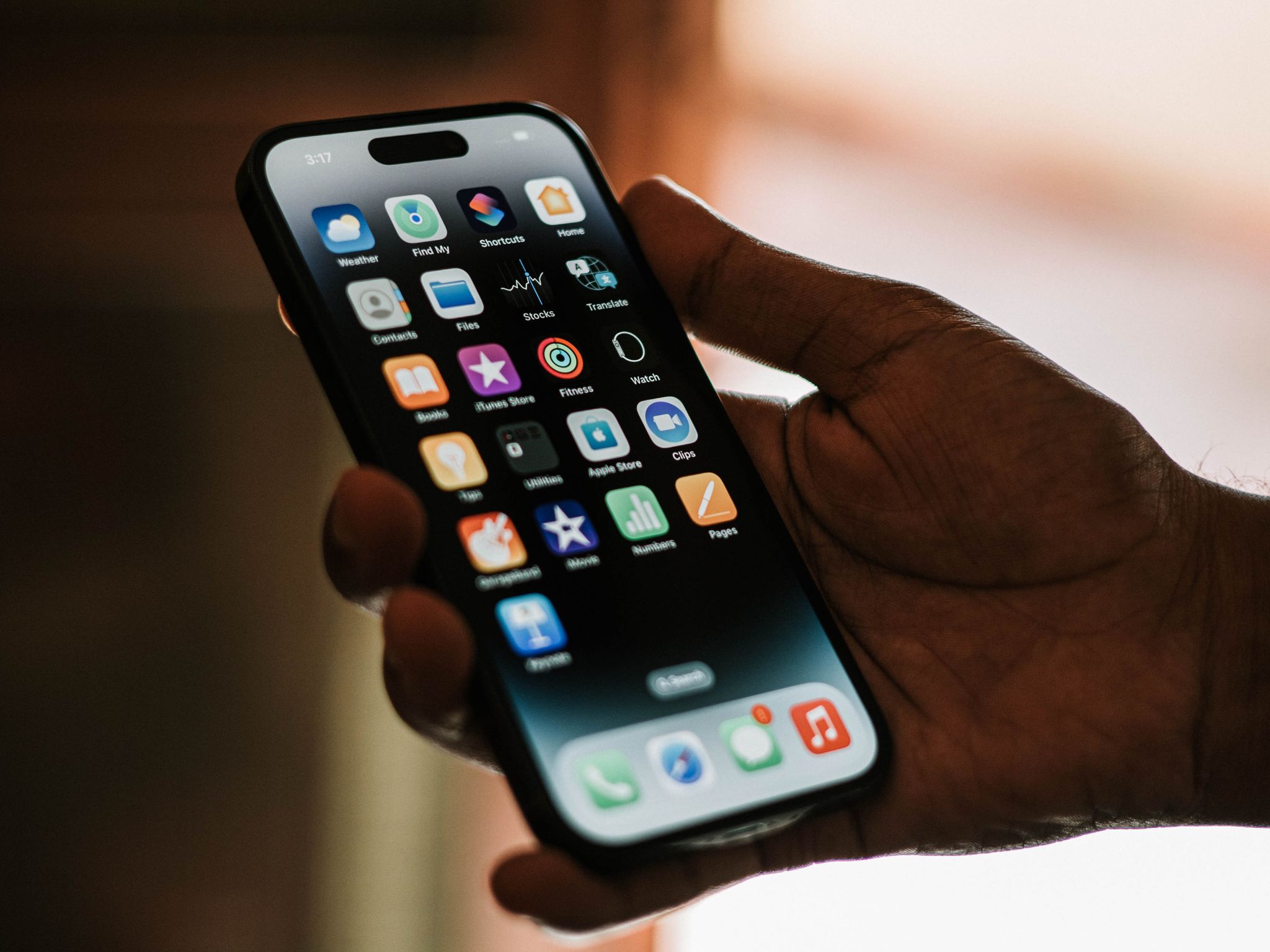Person using a phone at home