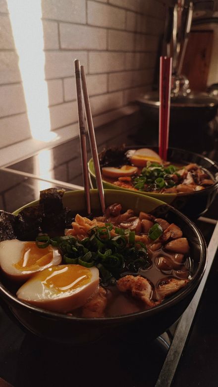 Homemade ramen bowls with egg and spring onion — photo by Yana Shabala on Pexels