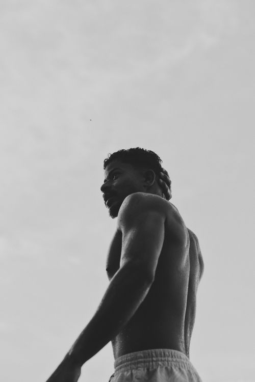Free Black and white portrait of a shirtless man outdoors, captured in Loreto, Brazil. Stock Photo