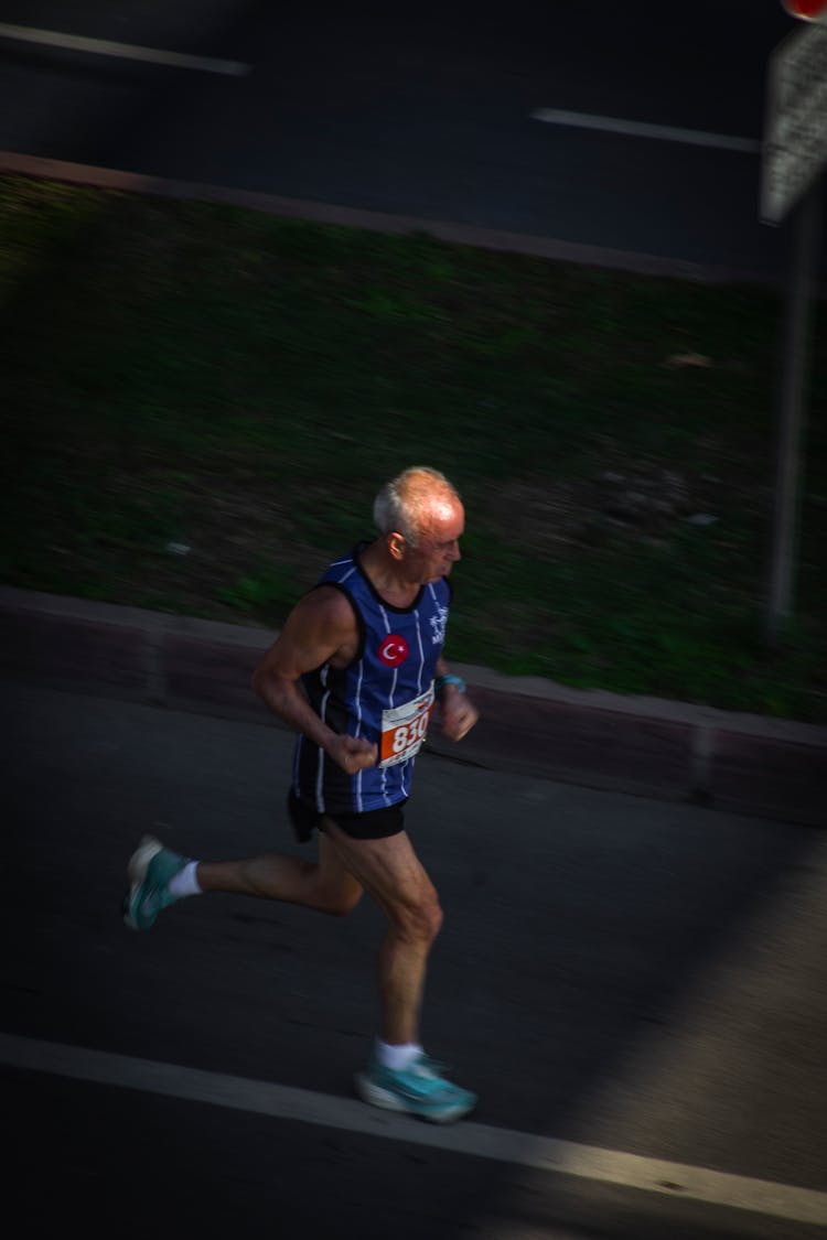 An Elderly Man Running