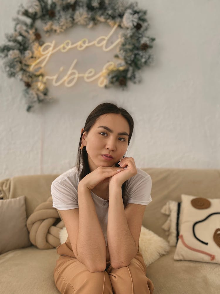 Woman Sitting On Couch