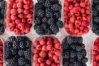 Blackberries And Raspberries In Clear Plastic Containers