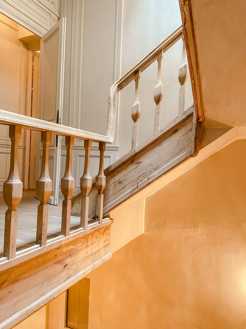 Free Beautiful wooden staircase with vintage carvings in a historic Istanbul home interior. Stock Photo